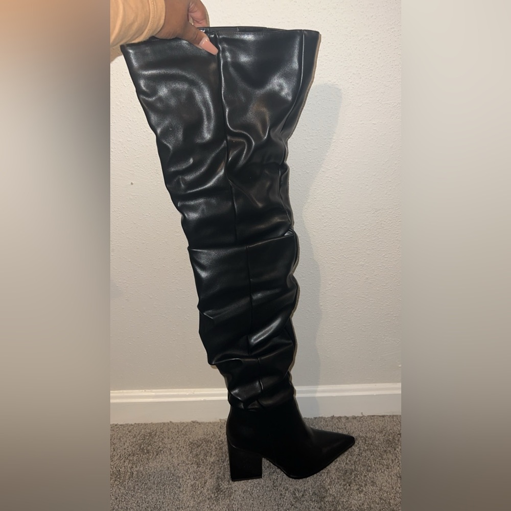 Black thigh high boots